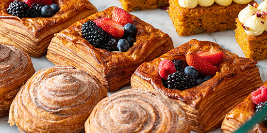Close up of a table with an assortment of pastries
