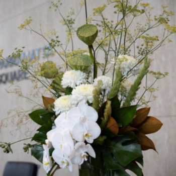 A close up photo of a flower arrangement inside one of the lobbies at Parramatta Square