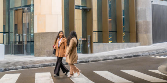 View of the street with people walking by Parramatta Square