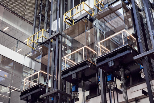 A view of elevators at Collins Square